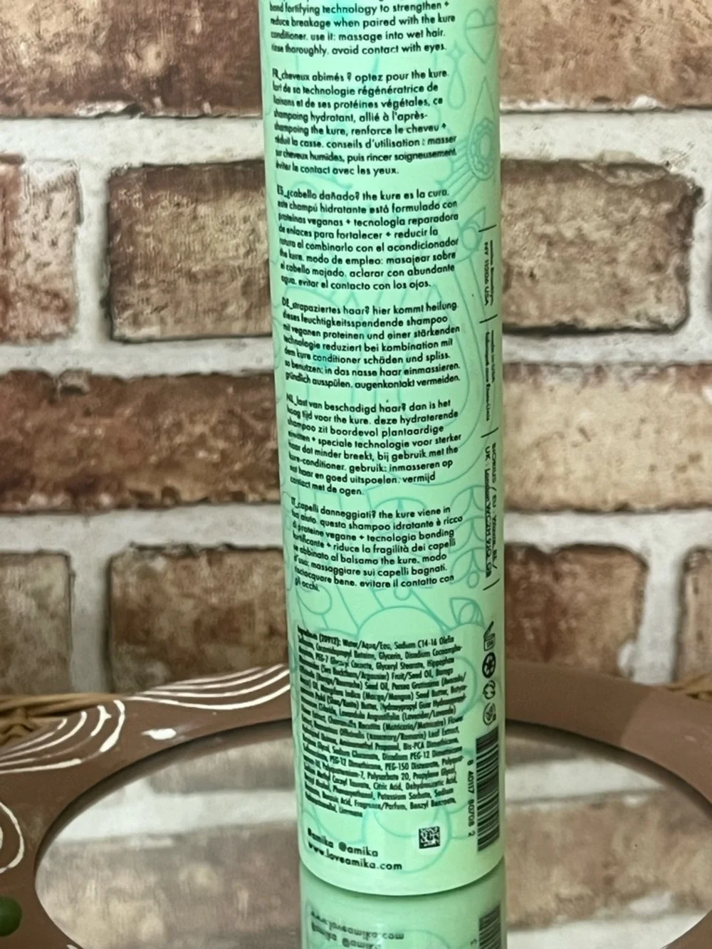 amika The Kure Strength Repair Shampoo - Mint Green Bottle